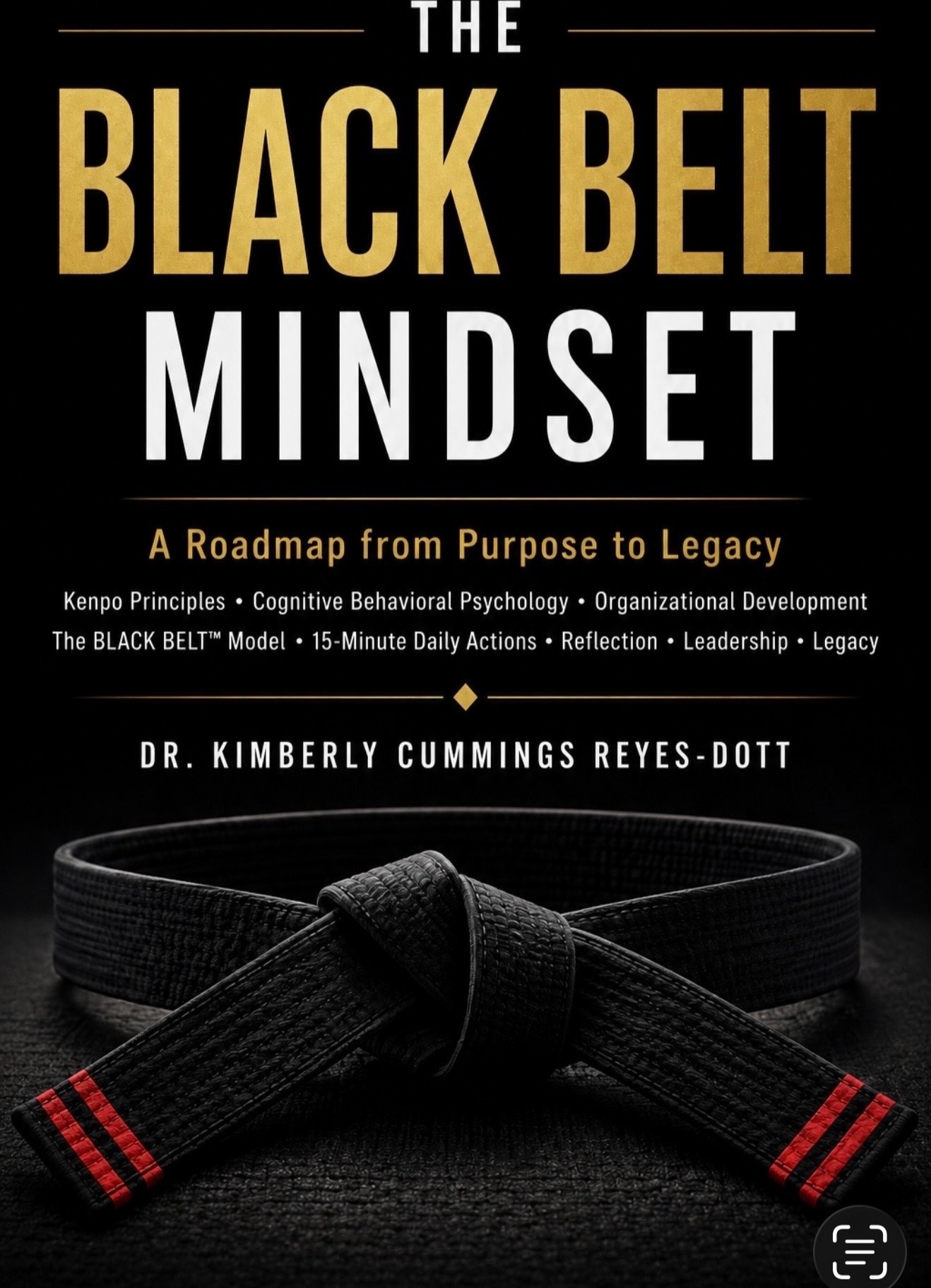Cover of The Black Belt Mindset, showing a black martial arts belt with red stripes on a black background behind the gold title